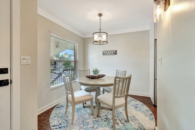 5770 Princess Palm Ct Unit F, Delray Beach, FL 33484 - dining area with a chandelier, crown molding, and dark wood-style flooring