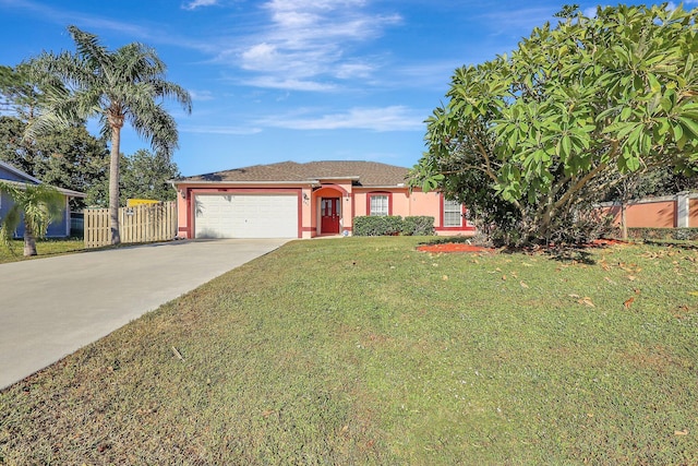 single story home with a garage and a front lawn