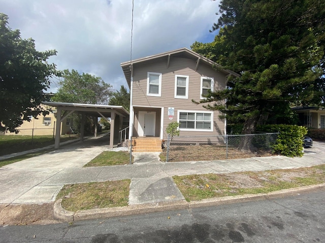 view of front of house with a carport