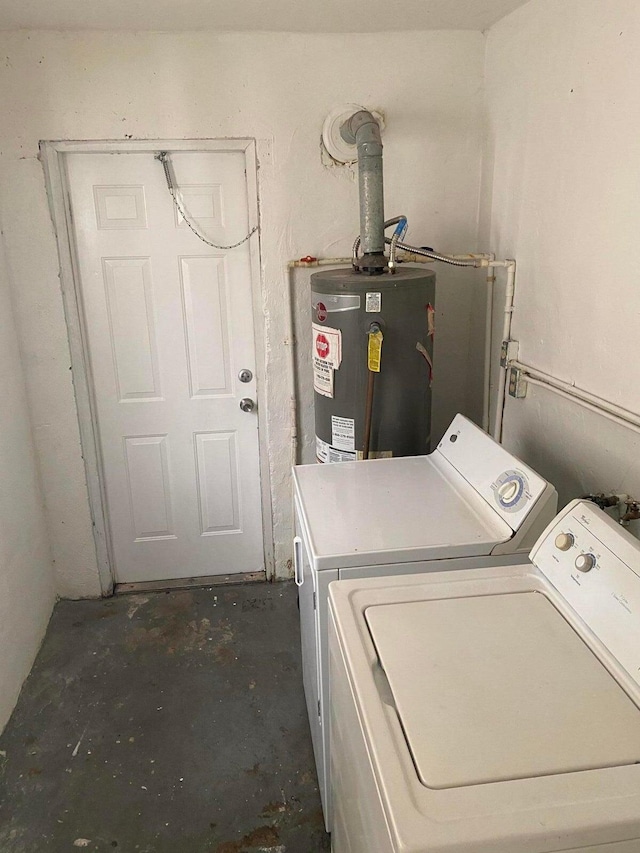 laundry area with water heater and washer and clothes dryer