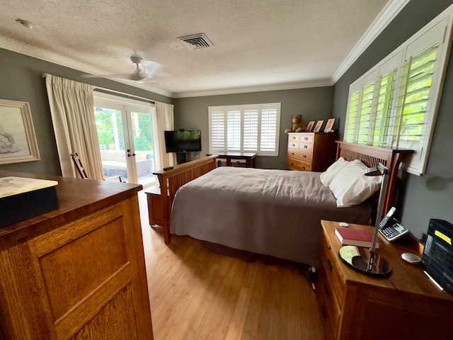 bedroom with french doors, ornamental molding, access to outside, ceiling fan, and light hardwood / wood-style floors