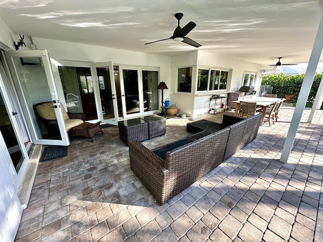 view of patio featuring french doors, an outdoor hangout area, and ceiling fan