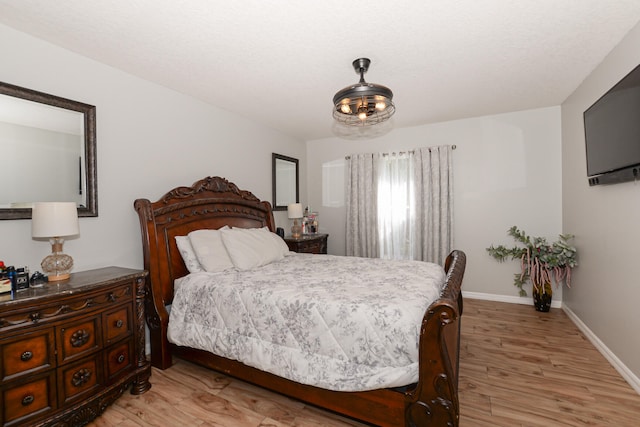 bedroom featuring hardwood / wood-style flooring