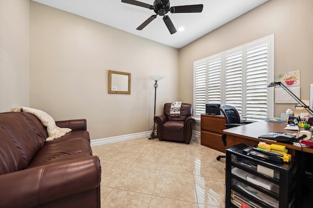 tiled office featuring ceiling fan