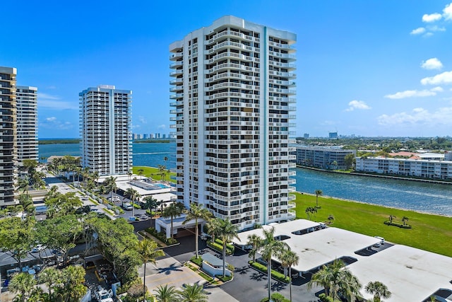 birds eye view of property with a water view