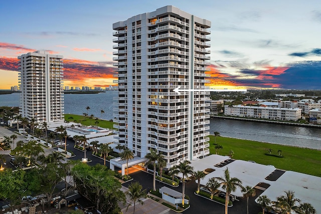 outdoor building at dusk with a water view