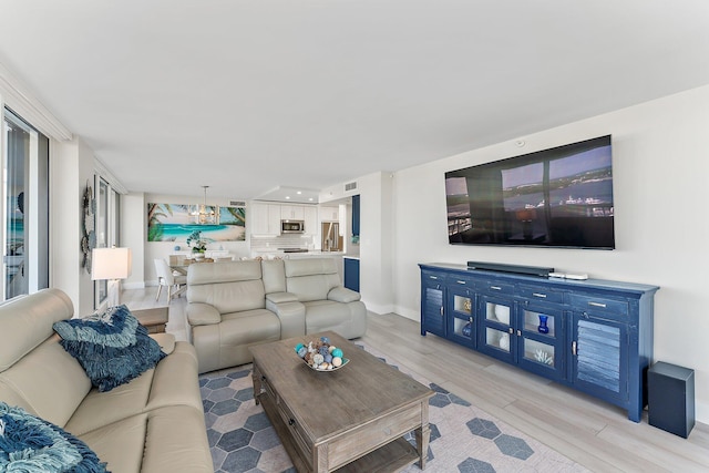 living room with light hardwood / wood-style floors