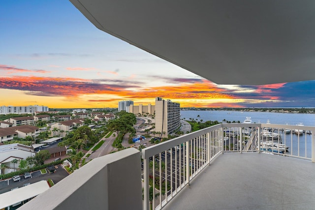 balcony at dusk with a water view