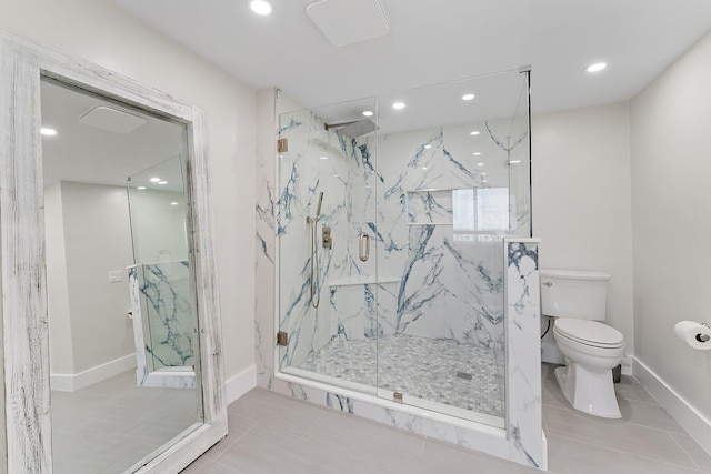 bathroom featuring an enclosed shower, toilet, and tile patterned floors