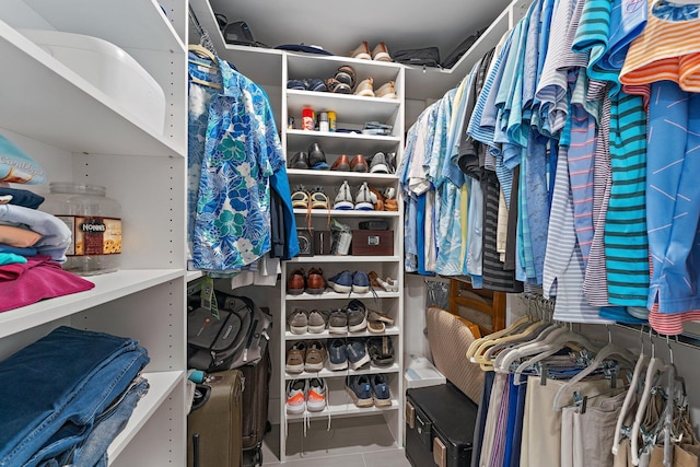 spacious closet with tile patterned flooring