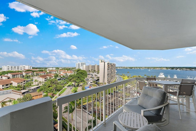 balcony featuring a water view