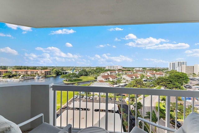 balcony featuring a water view