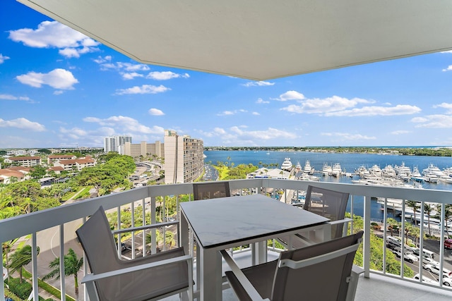 balcony featuring a water view