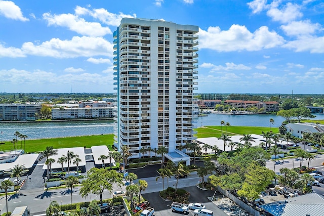 birds eye view of property with a water view