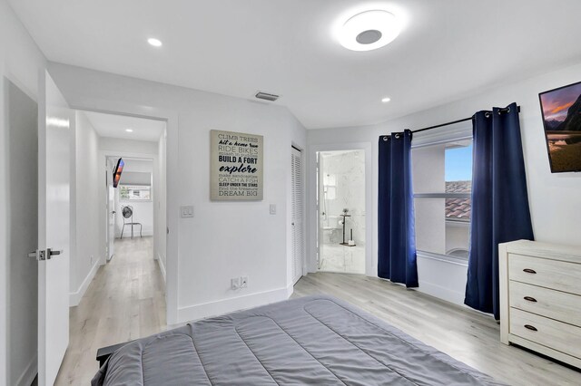 unfurnished bedroom with wood-type flooring and a closet