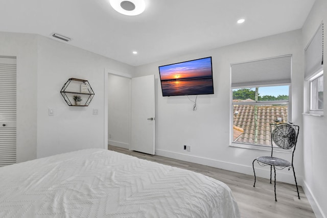 bedroom featuring light hardwood / wood-style floors