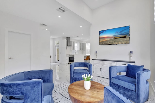 living room featuring sink