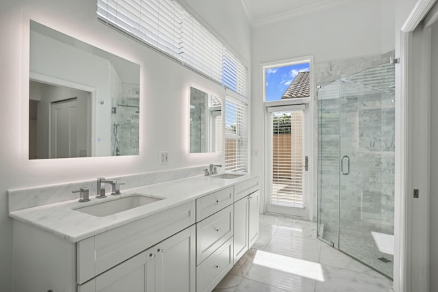 bathroom with vanity, walk in shower, and crown molding