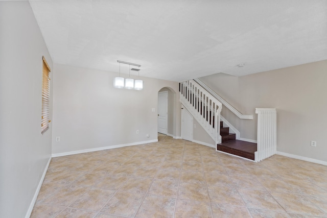 basement featuring light tile patterned floors