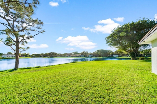 view of yard with a water view