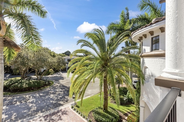 exterior space featuring decorative driveway