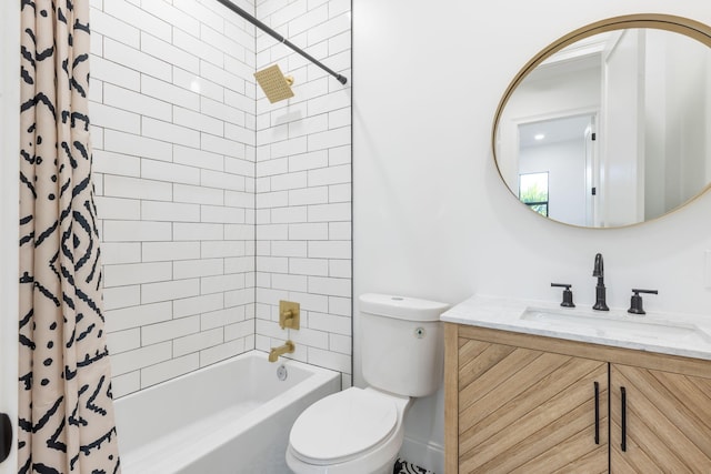 bathroom with vanity, toilet, and shower / bath combo with shower curtain