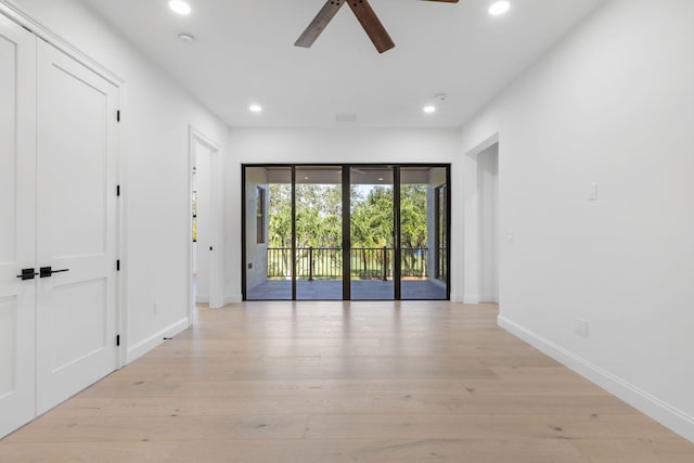 unfurnished room featuring light wood-style floors, recessed lighting, ceiling fan, and baseboards