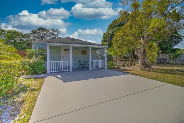 bungalow-style home featuring covered porch