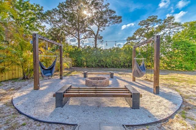 view of patio featuring a fire pit