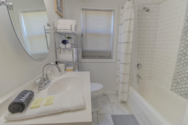 full bathroom featuring vanity, toilet, and shower / tub combo