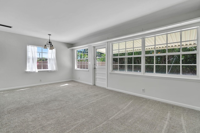 spare room featuring carpet flooring