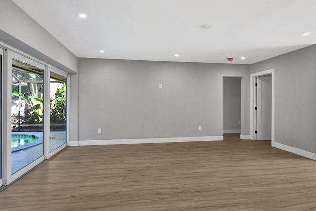 empty room featuring hardwood / wood-style floors