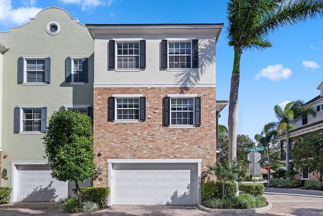 view of front of property featuring a garage