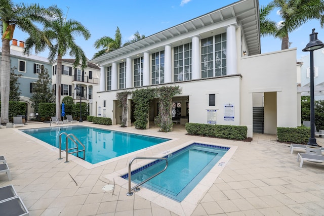 view of swimming pool with a patio area