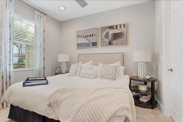 carpeted bedroom with ceiling fan, multiple windows, recessed lighting, and baseboards