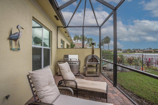 sunroom with a water view