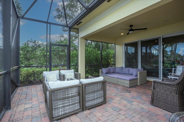 sunroom with ceiling fan and visible vents