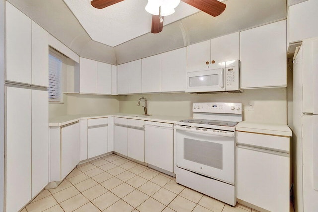 kitchen featuring light tile patterned flooring, white cabinetry, sink, ceiling fan, and white appliances