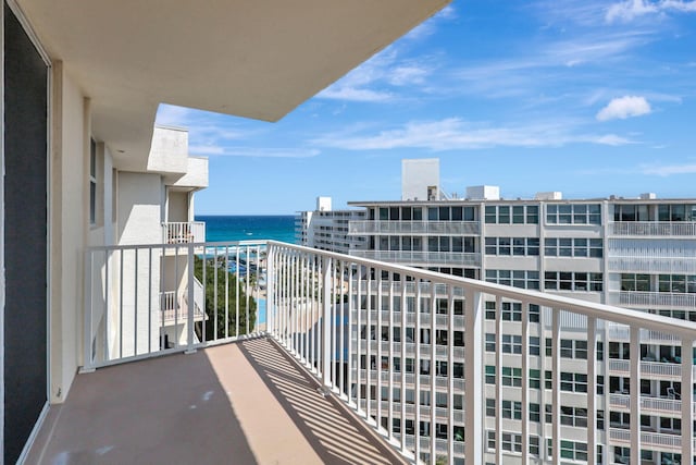 balcony featuring a water view