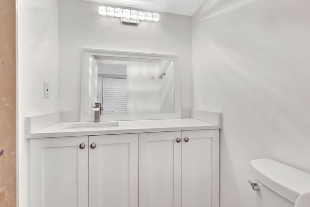 half bath with toilet and vanity