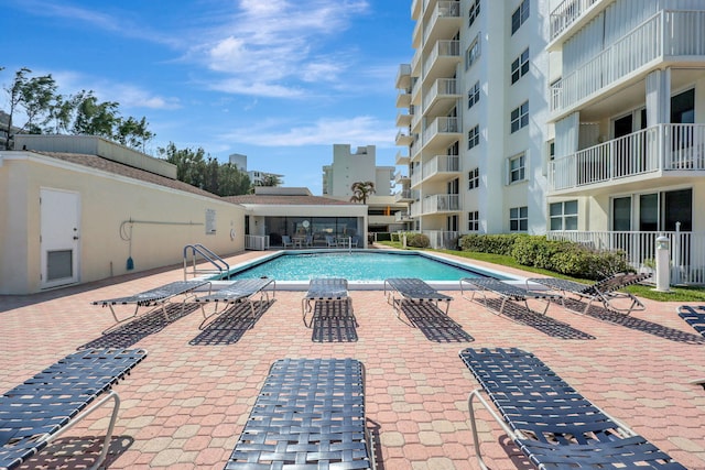 pool with a patio