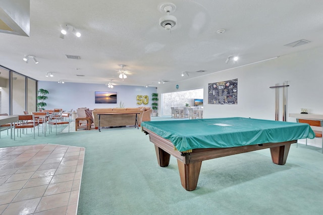 rec room featuring ceiling fan, light colored carpet, a textured ceiling, and pool table