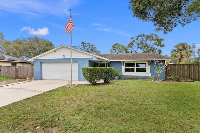 ranch-style home with a garage and a front yard