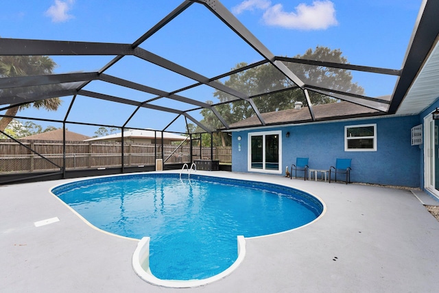 view of pool featuring a patio and a lanai