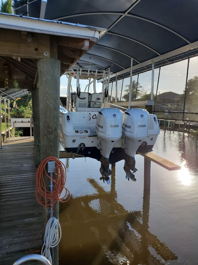 view of dock featuring boat lift