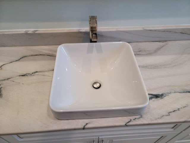 room details with a sink and a soaking tub