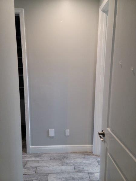 spare room featuring baseboards