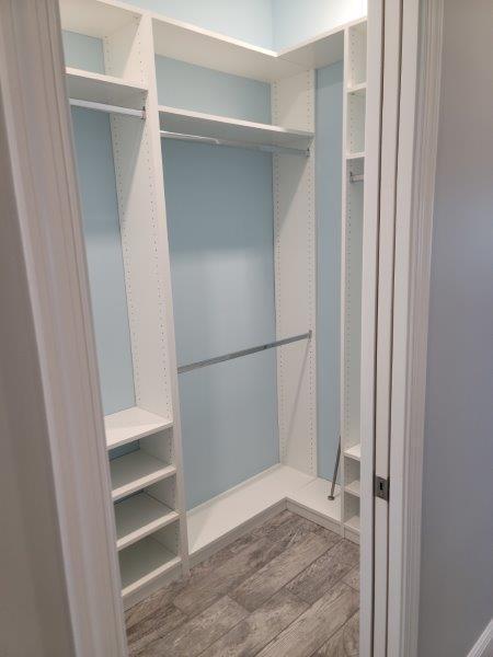 spacious closet featuring wood finished floors