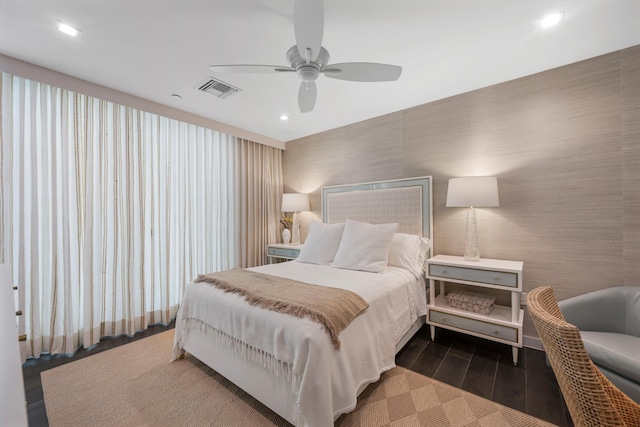 bedroom featuring ceiling fan and wood-type flooring