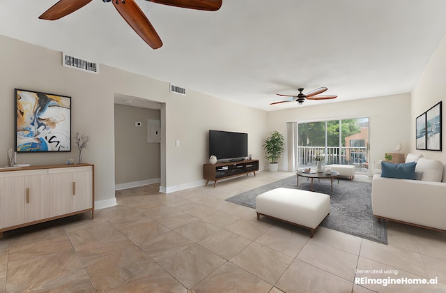 living room featuring ceiling fan and sink